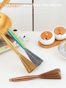 Detail of three 304 stainless steel pot brushes in gold, rainbow, and rose gold finishes