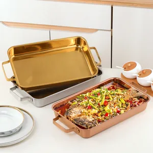 Rectangular stainless steel fish roaster trays in gold, silver, and rose gold finishes