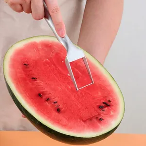 Manual stainless steel watermelon slicer and server fork for precise fruit cutting
