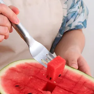 Stainless steel watermelon slicer cutter and fork tool showing a sharp fruit fork tip