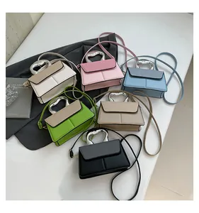 Detailed collection of six colorful crossbody bags with unique metallic handle designs