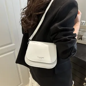 Minimalist white leather semi-circle flap crossbody bag with fashion trend lettering