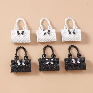 Set of 6 mini handbag charms with bow details and quilted texture for jewelry making