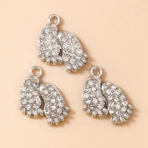 Three silver paw print charms with white rhinestones for DIY jewelry making