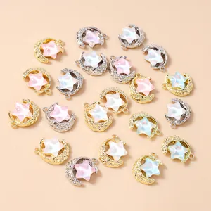 Detailed view of alloy moon and star pendants with colorful resin rhinestones for DIY