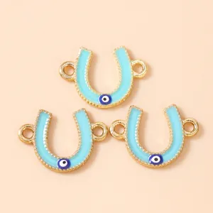 Pack of 3 horseshoe evil eye charm connectors with light blue enamel for DIY jewelry