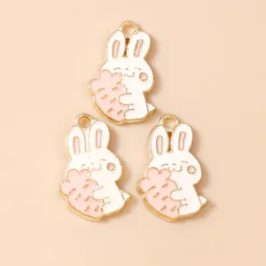 Three cute white cartoon rabbit charms with carrots for DIY jewelry and necklaces