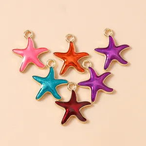 Detailed macro view of colorful enamel starfish pendants for DIY jewelry crafting