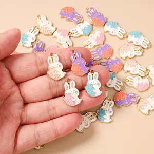 Detail of cartoon bunny holding carrot alloy charms for DIY necklaces and bracelets