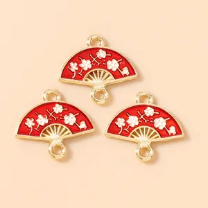 Traditional Chinese style fan charms with red enamel plum blossom design and gold plating