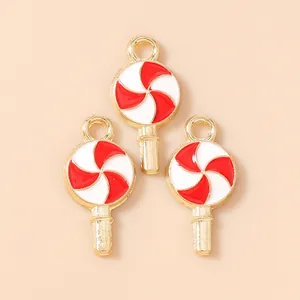 Trois pendentifs sucette dorés avec émail rouge et blanc pour création de bijoux DIY