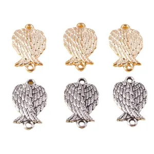 Engel Flügel Anhänger in Gold und Silber mit feiner Federstruktur und zwei Aufhängelöchern