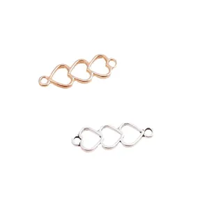 Conectores de joyería DIY de tres corazones en acabados pulidos de oro rosa y plata