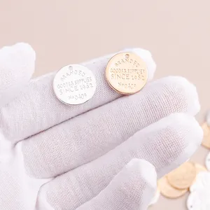 Golden and silver round geometric alphabet pendants with matte finish for DIY jewelry