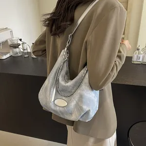 Stylish pearl blue hobo tote bag with silver chain strap for women in city style
