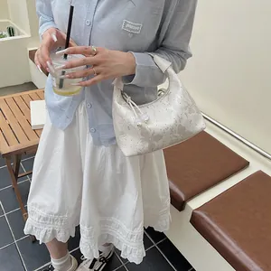 Elegant off-white butterfly print crescent handbag with drawstring beads for women