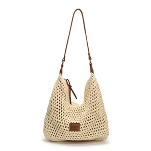 Borsa hobo artigianale in maglia crema con spalline in pelle marrone e interno a coulisse