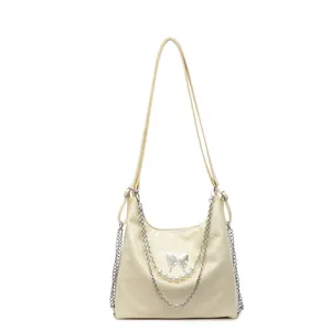 Creamy white large capacity tote bag with silver butterfly clasp and pearl chains