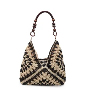 Bohemian hollow woven tote bag with contrast stitching and decorative wooden beads