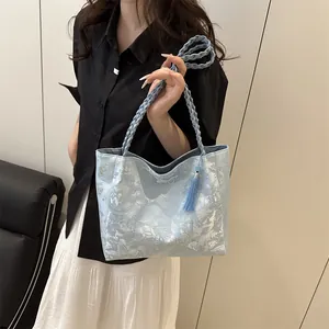 Light blue floral lace tote bag with butterfly embroidery and woven handles