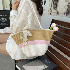 Three-color woven straw bucket bag with rope handles and lace bow for summer beach