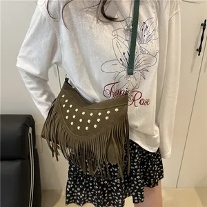 Retro bohemian crossbody bag with long fringes and metallic studs in olive green