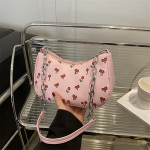 Pink underarm bag with red cherry prints and silver chain strap for women fashion