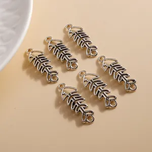 Set of 6 vintage hollow fishbone alloy charms for DIY jewelry with antique silver finish