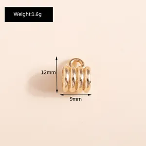 Detailed view of twisted gold alloy pendant with 12mm height and 9mm width dimensions