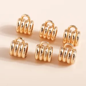 Golden twisted texture cylinder jewelry connectors with loops for DIY bracelet making