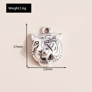Close-up of silver tiger head charm for DIY jewelry with 17x13mm size measurements