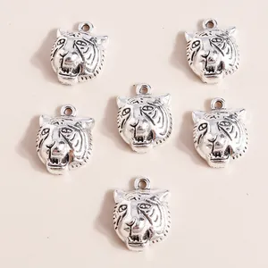 Set of six vintage silver alloy tiger head charms for DIY jewelry making accessories