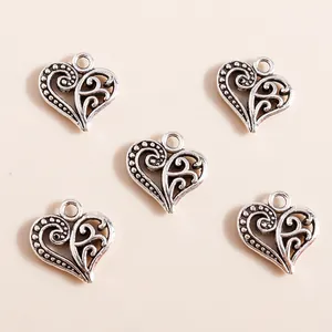 Five vintage hollow heart charms in antique silver finish for DIY jewelry making