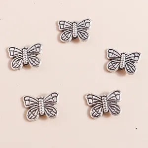Retro silver butterfly alloy pendants for DIY jewelry making in a five-piece arrangement