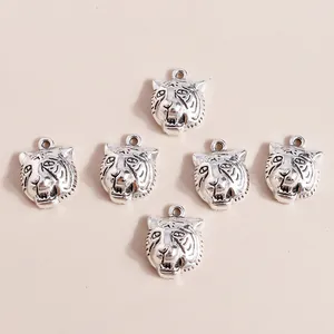 Retro silver tiger head zodiac pendants with embossed texture for DIY jewelry making