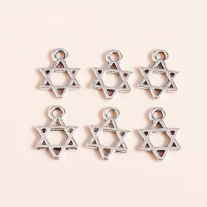 Macro detail of six pointed star alloy charms with antique silver finish for DIY jewelry