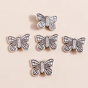 Retro butterfly alloy charms in antique silver finish for DIY jewelry making and pendants