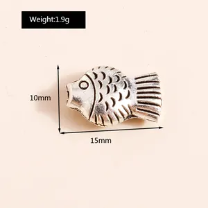 Detail showing vintage carp alloy pendant with weight 1.9g and height 10mm for DIY jewelry