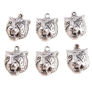 Set of six vintage silver tiger head alloy charms for DIY jewelry making and crafts