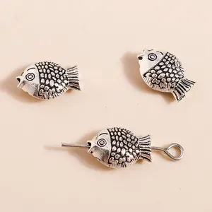 Set of silver alloy fish charms with vintage scales and a hole for DIY jewelry making
