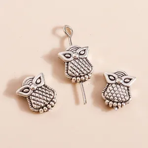 Set of 3 vintage silver owl pendants made of plated alloy for DIY jewelry crafting