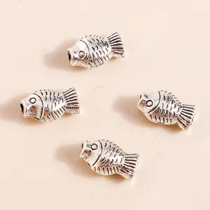 Set of vintage silver alloy koi fish charms with detailed scales for DIY jewelry making