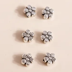 Retro silver alloy flower charms for DIY jewelry making with six plum blossom petals