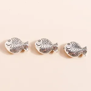 Three vintage silver-plated koi fish pendants with scales for DIY jewelry making