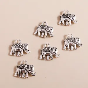 Vintage silver elephant charms set for DIY jewelry making with retro carved details