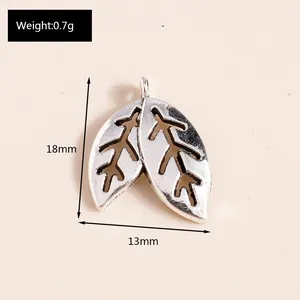Detailed view of silver alloy leaf pendant showing 18mm height and 13mm width dimensions