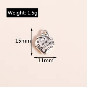 Detail view of strawberry alloy pendant showing dimensions of 15mm height and 11mm width