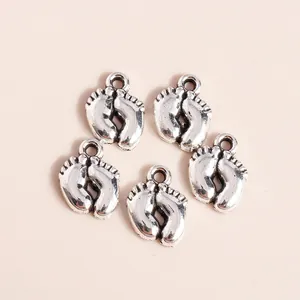 Five vintage silver alloy baby footprint charms for DIY jewelry making and pendants