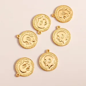 6-piece set of golden round coin pendants with embossed portraits for jewelry making