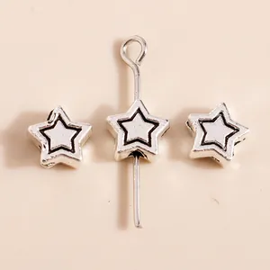 Vintage silver alloy star charms with engraved outlines for DIY jewelry making